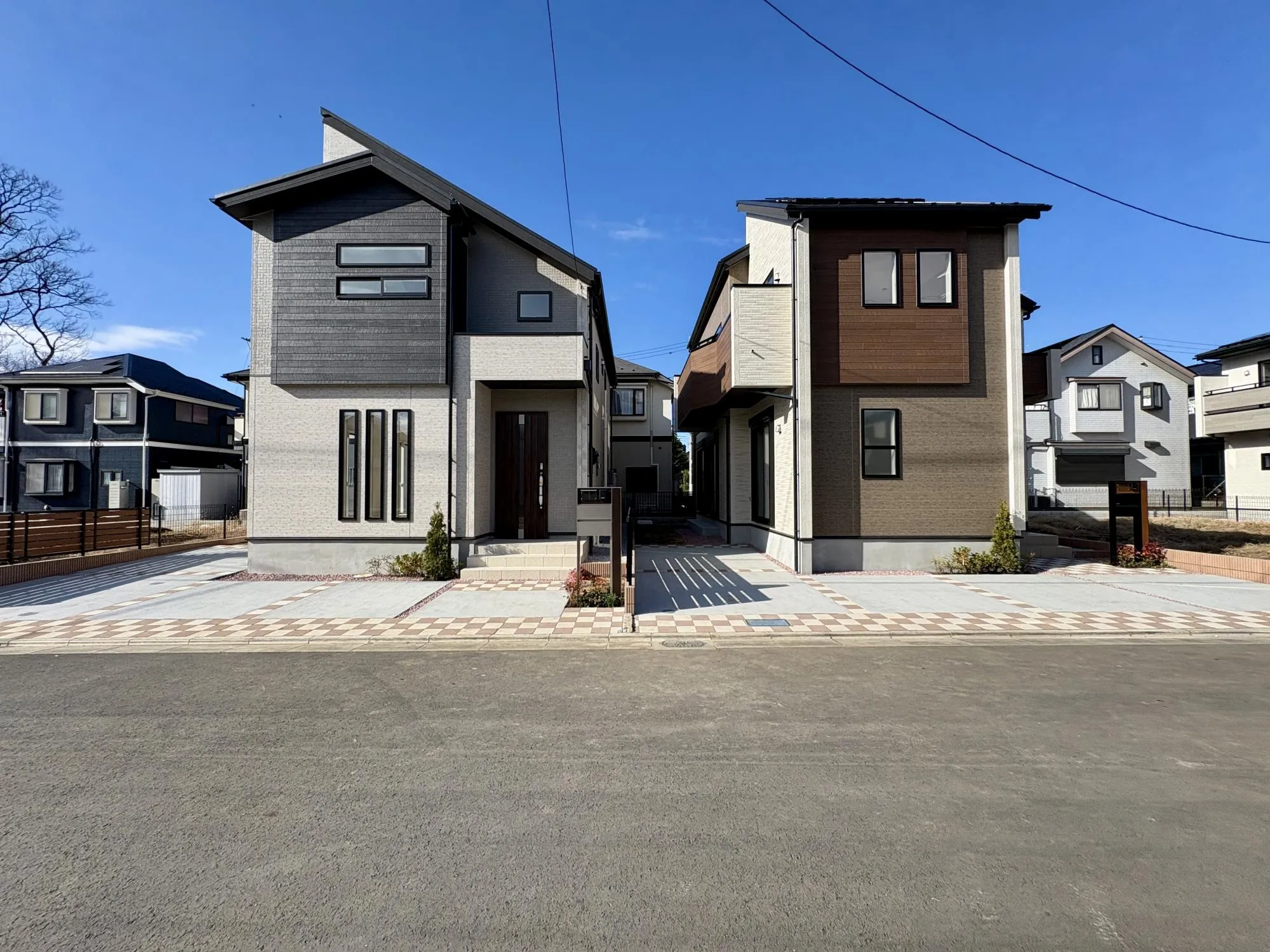 【外観写真(写真左11号棟、写真右10号棟)】