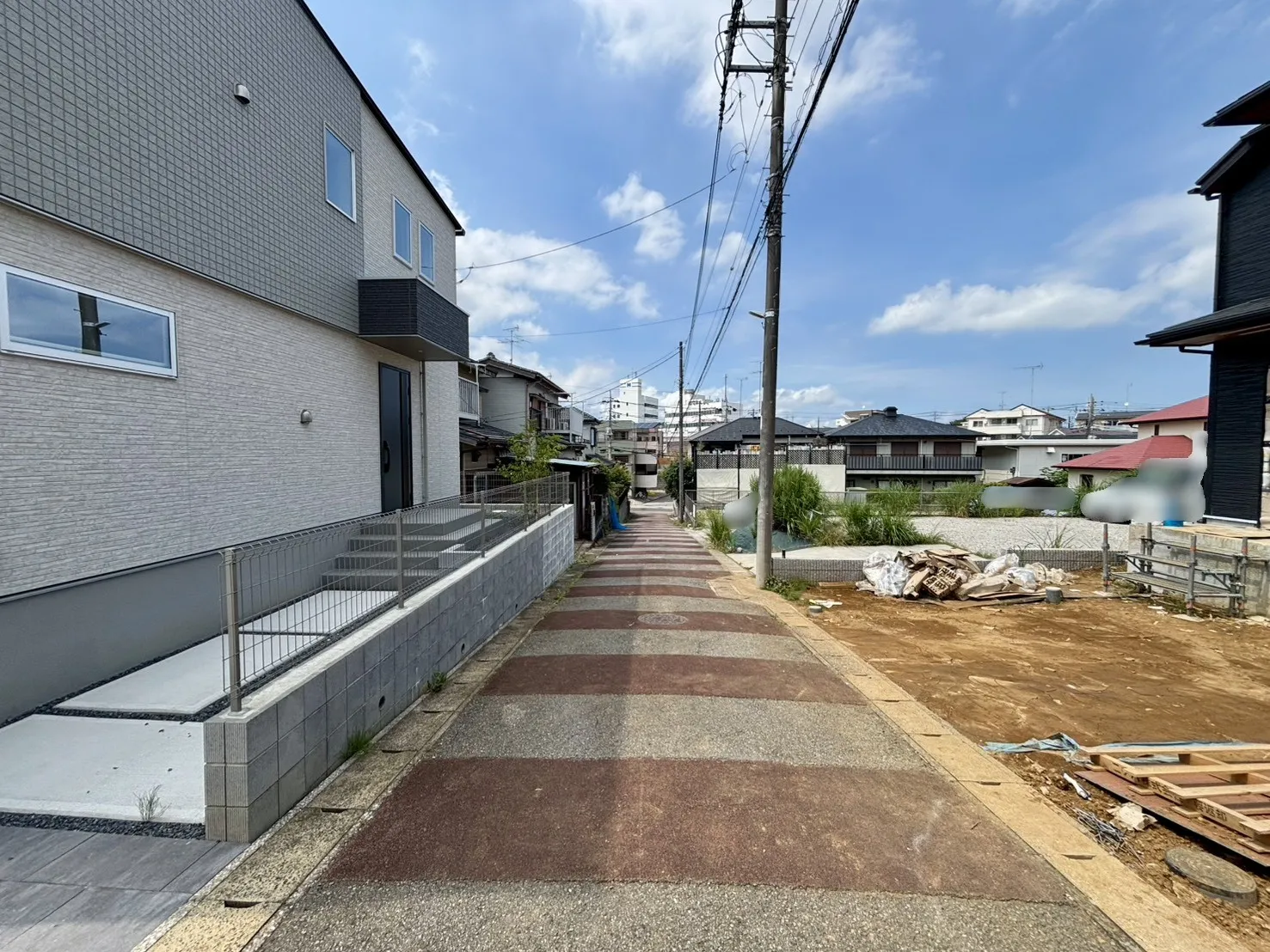 1号棟 前面道路含む現地写真(7/19撮影)